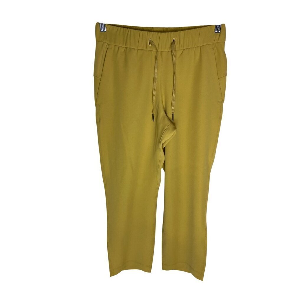 Lululemon On The Fly Crop *Woven 23" Vintage Gold-Sz 4